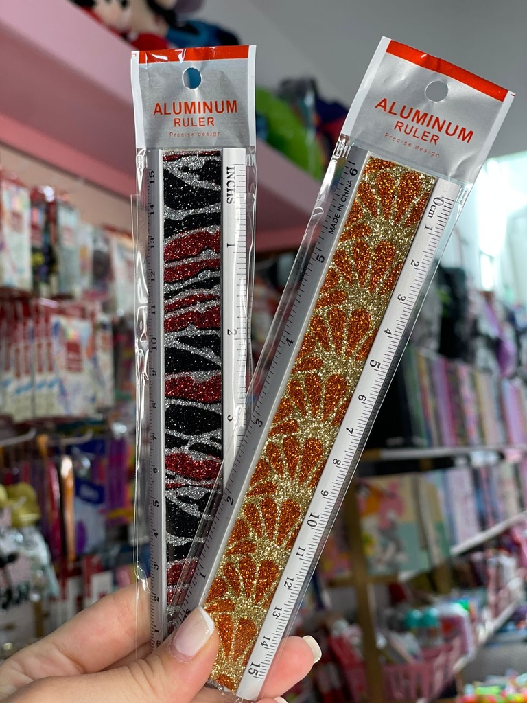 Regla metal y brillos 15cm