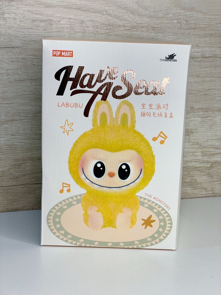 Caja sorpresa labubu sentado